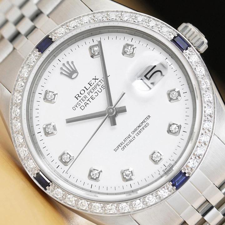 ROLEX MENS DATEJUST WHITE DIAL 18K WHITE GOLD STEEL DIAMOND SAPPHIRE WATCH: This is an authentic Rolex Datejust 1603 watch with Rolex dial Ref. with added genuine diamond markers, custom 18K white gold diamond and sapphire bezel, and custom stainless steel jubilee bracelet.