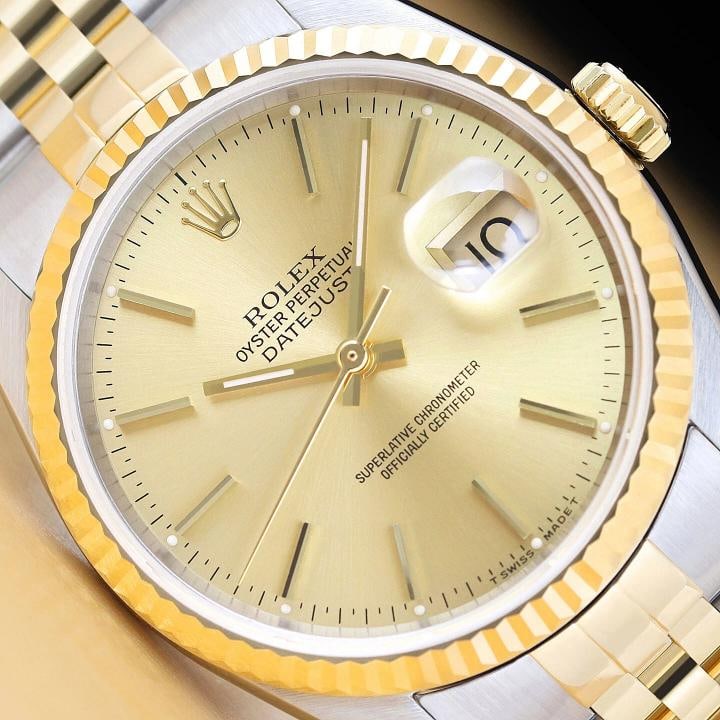 ROLEX MENS DATEJUST 16233 CHAMPAGNE DIAL 18K YELLOW GOLD STAINLESS STEEL WATCH: This is an authentic Rolex Datejust 16233 watch with original Rolex 18K yellow gold and stainless steel jubilee bracelet, Rolex stick dial, and Rolex 18K yellow gold fluted bezel. Descriptions: