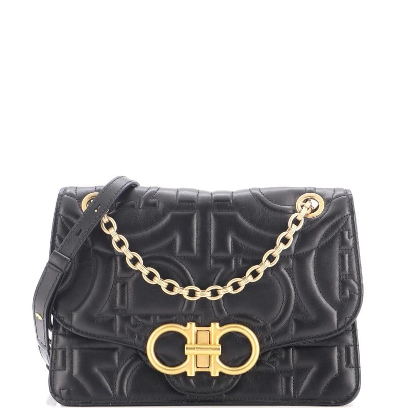 Salvatore Ferragamo Gancini Turnlock Flap Bag Gancini Quilted Leather Medium: Measurements: Handle Drop 11", Height 6", Width 10", Depth 3", Strap Drop 20" . Condition: Pre-owned - Excellent,Brand: Salvatore Ferragamo,Exterior Material: Leather,Style: Shoulder Bags,Exterior