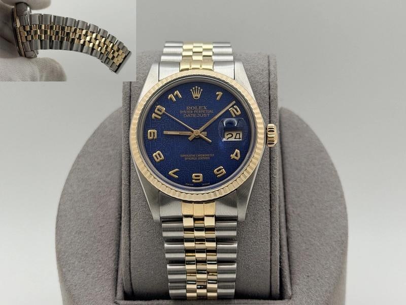 Rolex Datejust 16013 36mm Blue Jubilee Dial 18k Yellow Gold Stainless Steel: Style Number: 16013 Serial: 66***** Year: 1981 Model: Rolex Datejust Case Material: Stainless Steel Band: 18k Yellow Gold & Stainless Steel Jubilee Bezel: 18k Yellow Gold Fluted Dial: Blue Jubilee