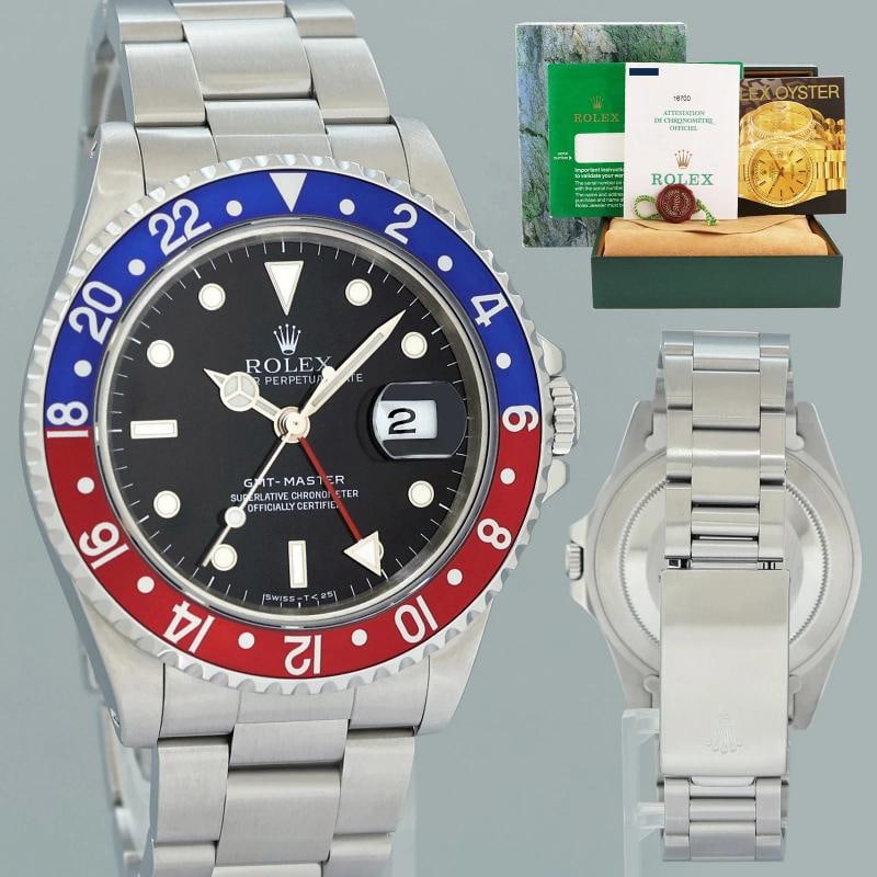 1991 PAPERS MINT Rolex 16700 GMT Pepsi Blue Red Steel Oyster 40mm Watch Box: Case & Dial Case Material: Rolex Stainless Steel Case Size: 40mm Bezel: Rolex Steel Red and Blue Pepsi Crystal: Rolex Sapphire Dial: Rolex Black Movement & Bracelet Movement: Rolex Automatic Bracelet 