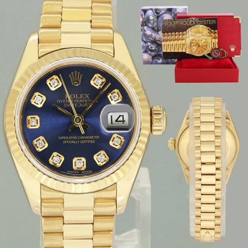 MINT Blue Diamond Ladies Rolex DateJust 69178 President 26mm 18k Yellow Gold: Case & Dial Case Material: Rolex Yellow Gold Case Size: 26mm Bezel: Rolex Yellow Gold Fluted Crystal: Rolex Sapphire Dial: Custom Blue Diamond Movement & Bracelet Movement: Rolex Automatic Bracelet