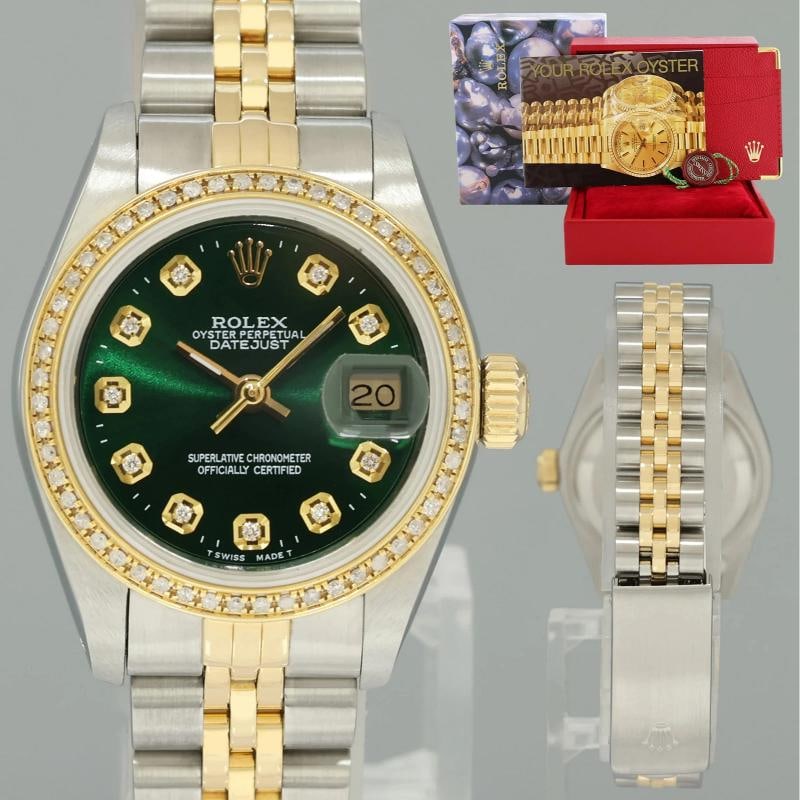 GREEN DIAMOND Ladies Rolex DateJust 26mm 69173 Two Tone Gold Jubilee Watch: Case & Dial Case Material: Rolex Two-Tone Yellow Gold & Stainless Steel Case Size: 26mm Bezel: Custom Natural Round Diamond Bezel Crystal: Rolex Sapphire Dial: Custom Green Diamond Movement &