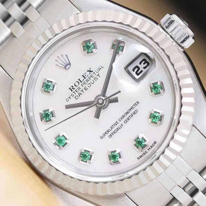 ROLEX LADIES DATEJUST 79174 MOTHER OF PEARL TSAVORITE DIAL 18K GOLD STEEL WATCH: Condition: Pre-owned - Excellent,Bezel Color: Silver,Max Wrist Size: 6.26-6.75 in,Number of Jewels: 31 Jewels,Indices: Tsavorite Markers, 12-Hour Dial,Band: Rolex Stainless Steel Jubilee