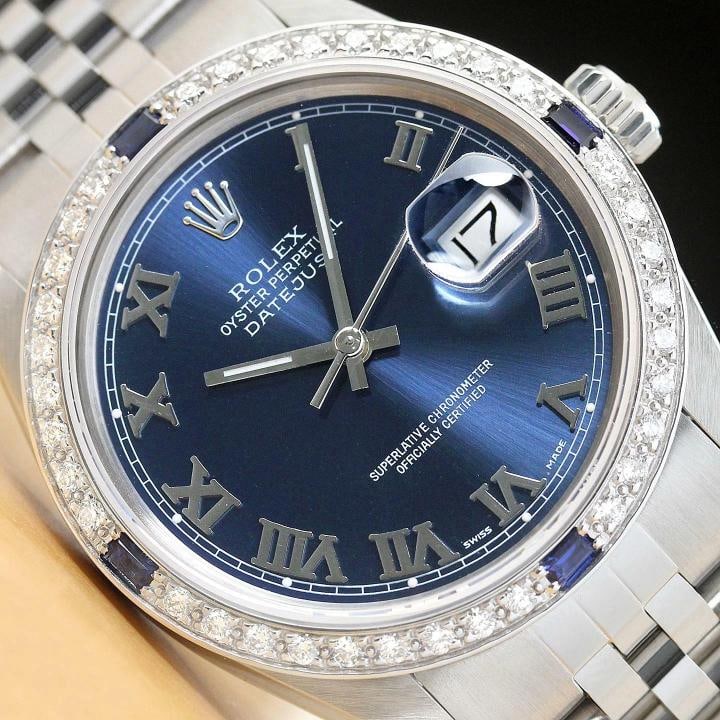 MENS ROLEX DATEJUST BLUE ROMAN DIAMOND SAPPHIRE 18K WHITE GOLD STEEL WATCH: Condition: Pre-owned - Excellent,Bezel Color: Silver,Max Wrist Size: 7.26-7.5 in,Number of Jewels: 27 Jewels,Indices: Roman Numerals, 12-Hour Dial,Bezel: Custom 18K White Gold Sapphire Diamond
