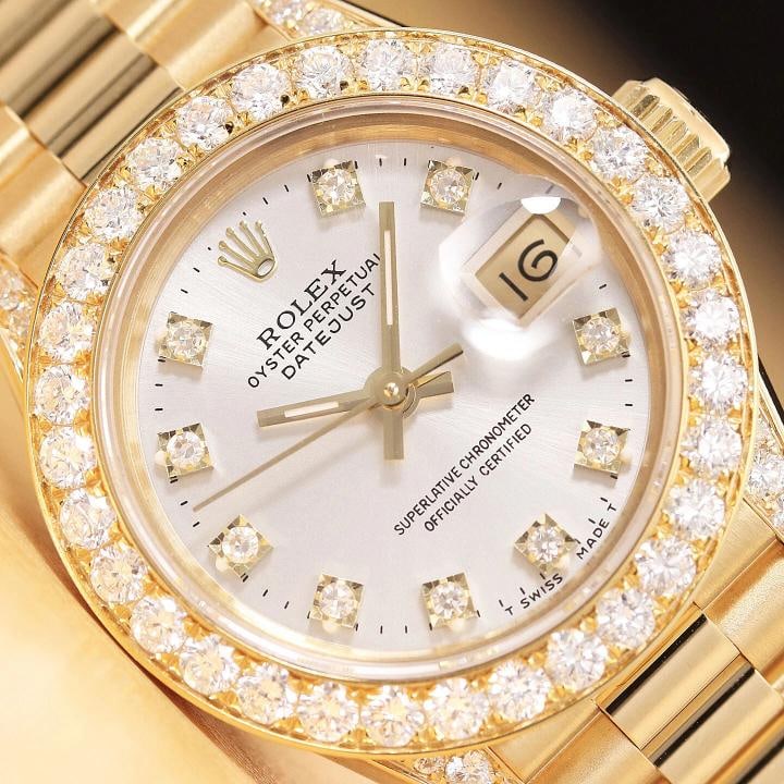 ROLEX LADIES DATEJUST PRESIDENT FACTORY DIAMOND DIAL 1.5 CT BEZEL 18K GOLD WATCH: Condition: Pre-owned - Excellent,Bezel Color: Gold,Max Wrist Size: 6.26-6.75 in,Number of Jewels: 29 Jewels,Indices: Diamond Markers, 12-Hour Dial,Band: Rolex 18K Yellow Gold President Bracelet,Bezel: