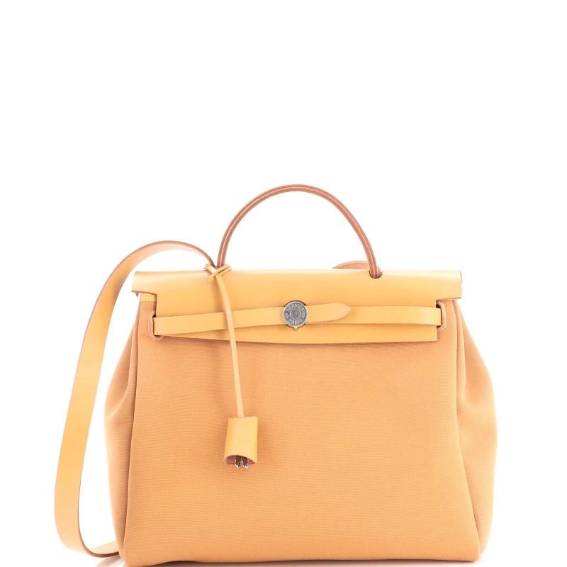Hermes Herbag Zip Verso Leather and Toile 31: Condition: Pre-owned - Good,Brand: Hermes,Exterior Material: Canvas Plain, Leather,Style: Shoulder Bags,Exterior Color: Brown,Department: Women,Size: 31,Accessories: Leather Stopper (Herbag), Dust Bag