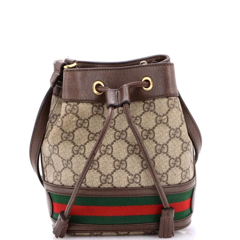 Gucci Ophidia Bucket Bag GG Coated Canvas Mini: Condition: Pre-owned - Fair,Brand: Gucci,Exterior Material: Canvas Coated,Style: Bucket,Exterior Color: Brown,Department: Women,Size: Mini Estimated Retail Price: $1,400 Condition: Fair. Exterior: