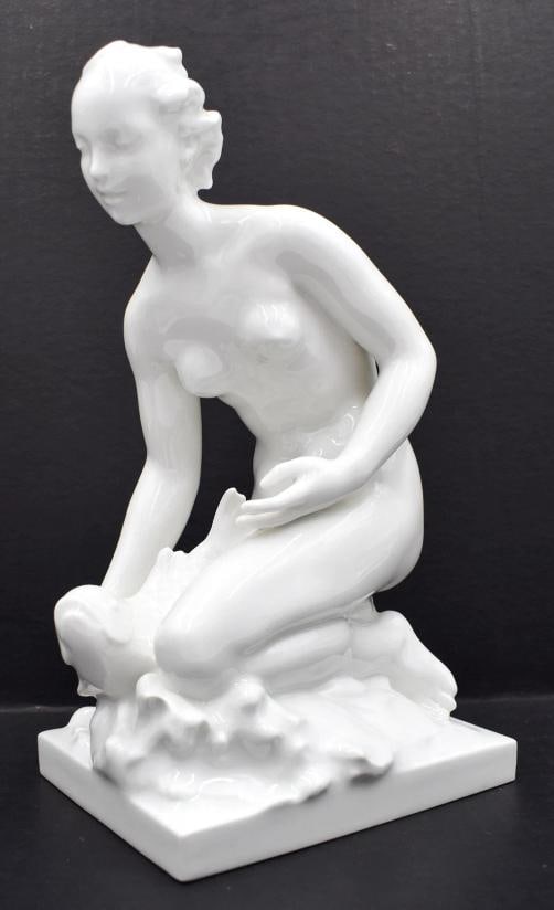 KPM Berlin Art Deco Porcelain Figure of Woman with Fish, White Glaze, Circa 1930: Measures 10" high by 4 1/4" wide by 6" deep. . Condition: Used,Brand: KPM,Type: Figurine,Style: Art Deco,Material: Porcelain,Subject: Woman,Country of Origin: Germany