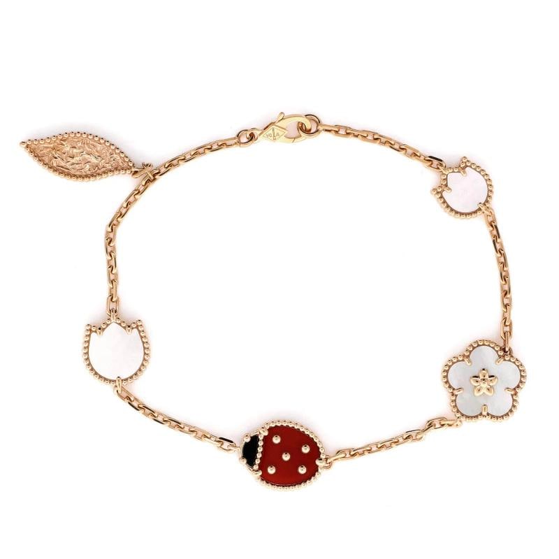 Van Cleef & Arpels Lucky Spring 5 Motifs Bracelet 18K Rose Gold and Mother of: Measurements: Circumference: 6.25 ", Width: 1.5 mm . Condition: Pre-owned - Good,Brand: Van Cleef & Arpels,Main Stone: Mother Of Pearl,Metal: 18K Rose Gold,Metal Purity: 18K,Style: Bracelet,Type: