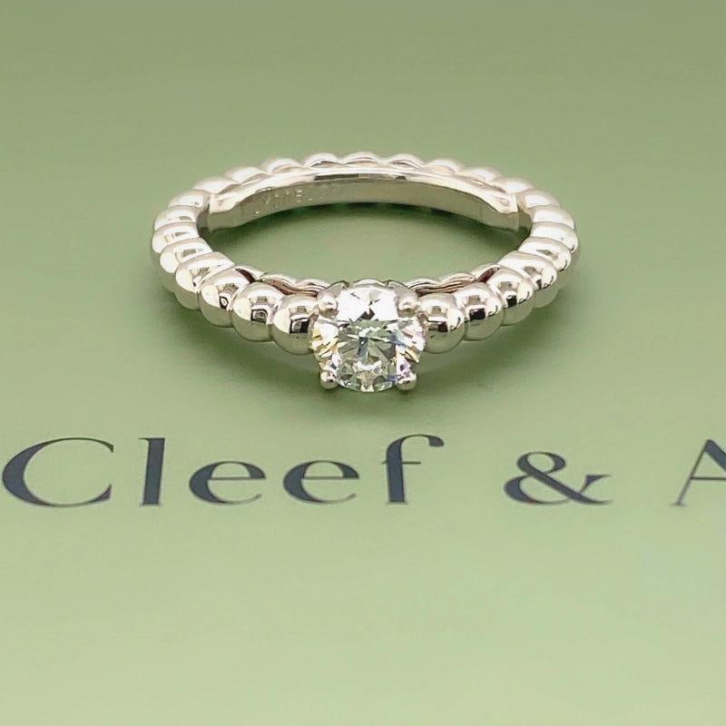 Van Cleef & Arpels Perlee Diamond Engagement Ring 0.50 cts DVVS2 18k White Gold: Condition: Pre-owned - Excellent,Main Stone Creation: Natural,Cut Grade: Excellent,Main Stone Color: White/Colorless,Metal: White Gold,Total Carat Weight: 0.50 ctw - 0.74 ctw,Secondary Stone: