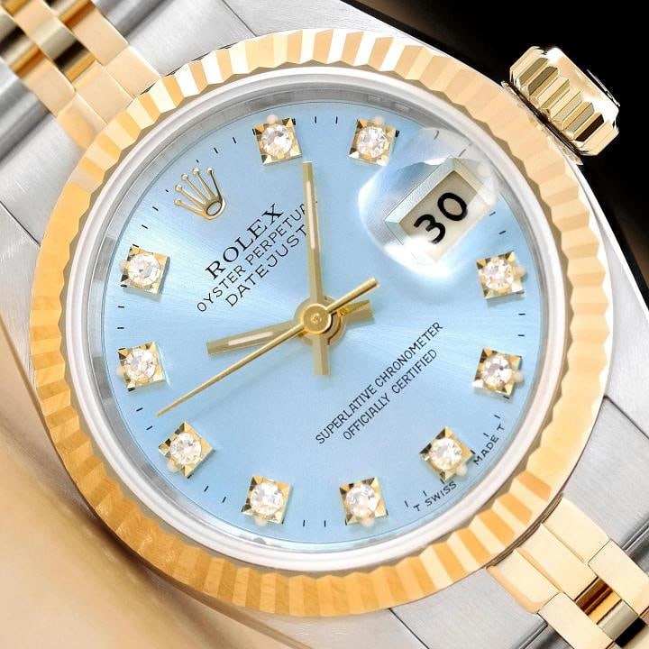 ROLEX LADIES DATEJUST 69173 ICE BLUE FACTORY DIAMOND DIAL 18K GOLD STEEL WATCH: This is an authentic Rolex Datejust 69173 watch with Rolex 18K yellow gold and stainless steel jubilee bracelet, factory Rolex diamond dial Ref., and Rolex 18K yellow gold fluted bezel. Descriptions: 