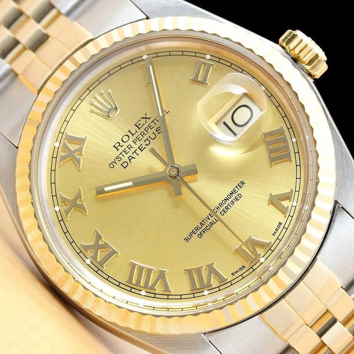 ROLEX MENS DATEJUST 16013 CHAMPAGNE ROMAN 18K YELLOW GOLD STEEL QUICKSET WATCH: Condition: Pre-owned - Excellent,Bezel Color: Gold,Max Wrist Size: 7.26-7.5 in,Number of Jewels: 27 Jewels,Indices: Roman Numerals, 12-Hour Dial,Bezel: Rolex 18K Yellow Gold Fluted Bezel,Band/Strap: B