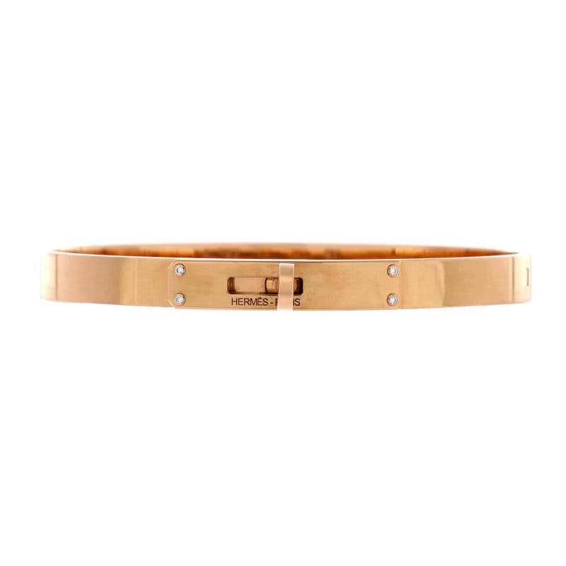 Hermes Kelly Bracelet 18K Rose Gold with 4 Diamonds Small: Measurements: Circumference: 6.00 ", Width: 5.55 mm . Condition: Pre-owned - Good,Brand: Hermes,Main Stone: Diamond,Metal: 18K Rose Gold,Metal Purity: 18K,Style: Bracelet,Type: Bracelet,Color: Rose Go