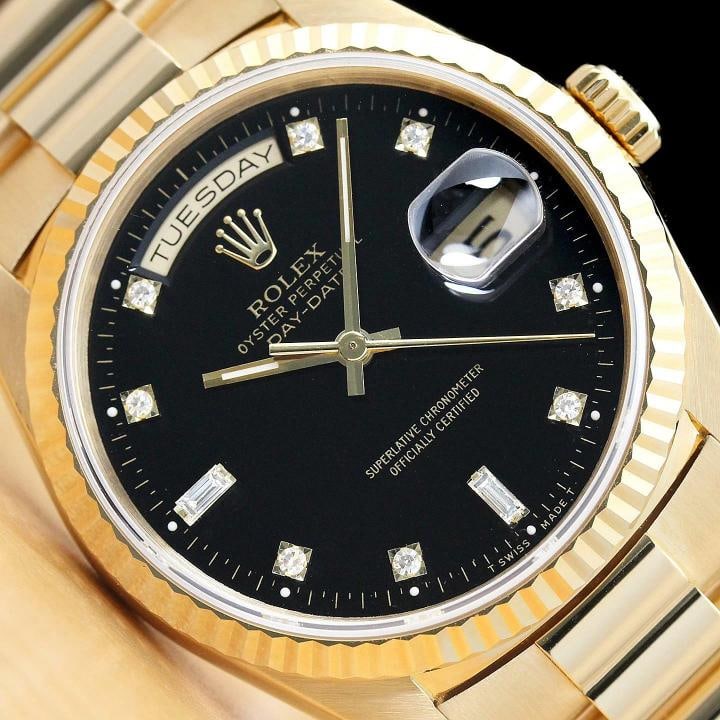 ROLEX MENS DAYDATE 18238 BLACK FACTORY DIAMOND DIAL 18K GOLD PRESIDENT WATCH: This is an authentic Rolex Day-Date 18238 watch with 18K yellow gold president bracelet, factory Rolex diamond dial Ref., Rolex 18K yellow gold fluted bezel, and factory Rolex box. Descriptions: Brand
