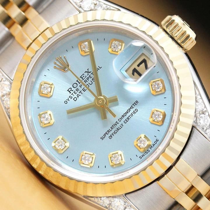 ROLEX LADIES DATEJUST 69173 ICE BLUE DIAL 18K GOLD STEEL DIAMOND LUG WATCH: This is an authentic Rolex Datejust 69173 watch with Rolex 18K yellow gold and stainless steel jubilee bracelet, Rolex dial Ref. with added genuine diamond markers, Rolex 18K yellow gold fluted bezel,
