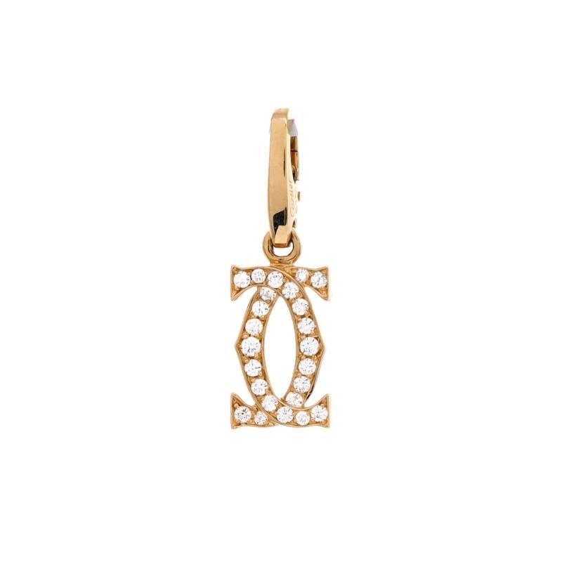 Cartier Double C Charm Pendant Pendant & Charms 18K Yellow Gold and Diamonds: Measurements: Height/Length: 15.95 mm, Width: 7.95 mm . Condition: Pre-owned - Good,Brand: Cartier,Main Stone: Diamond,Metal: 18K Yellow Gold,Metal Purity: 18K,Style: 18K Yellow Gold And Diamonds,Type
