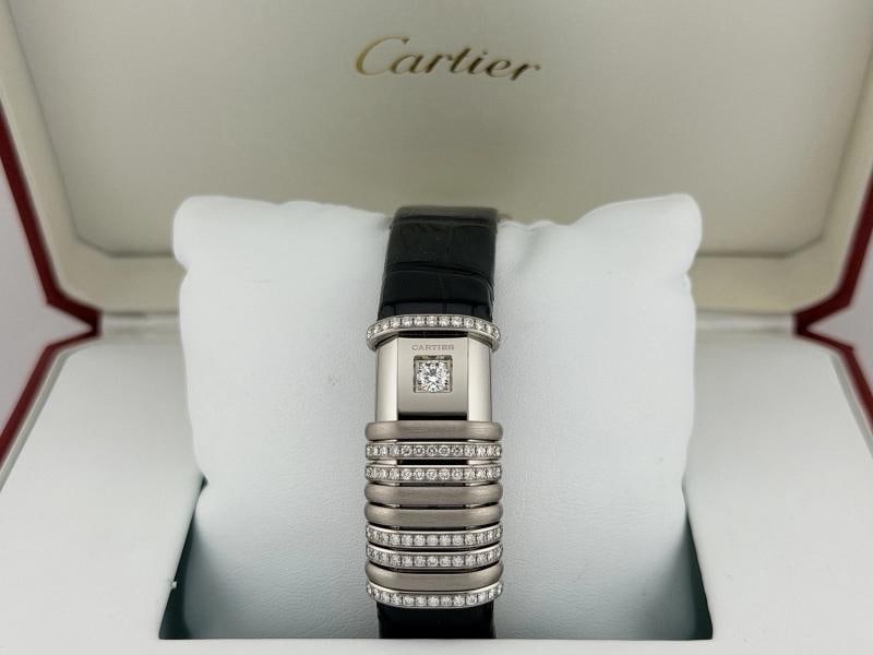 Cartier Declaration 2611 WT000450 18k White Gold 6 Diamond Bars Titanium: Condition: Pre-owned - Excellent,Bezel Color: Silver,Movement: Quartz,Seller Warranty: Yes,Reference Number: 2611, WT000450,Band/Strap: Two-Piece Strap,Brand: Cartier,Case Color: Silver,Type: Wristwat