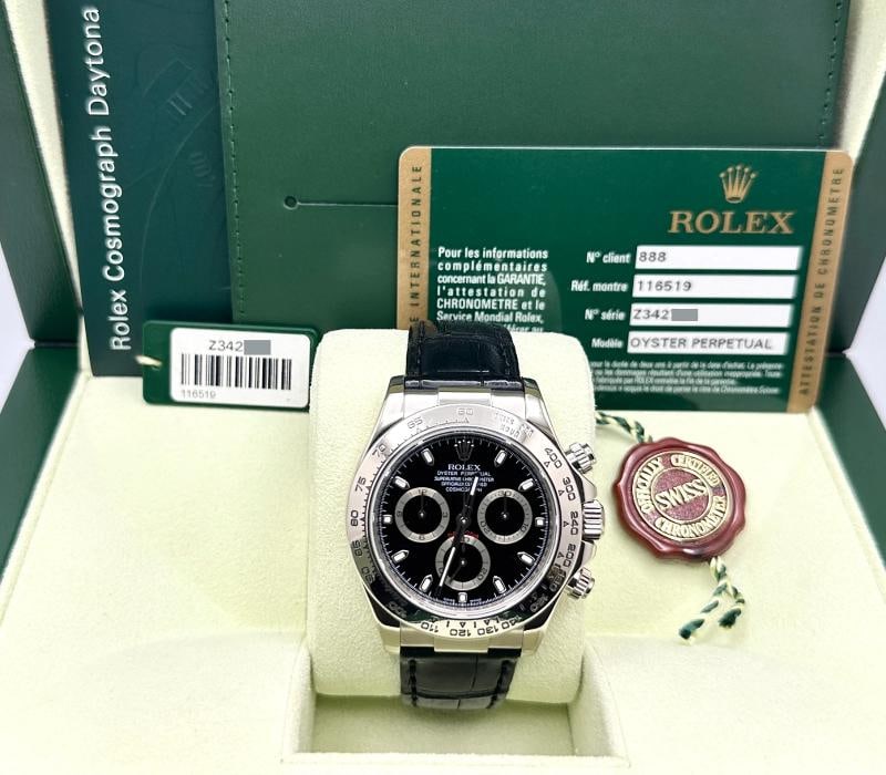 Rolex Daytona Cosmograph 116519 40mm 18k White Gold Black Dial Box Paper: Condition: Pre-owned - Excellent,Bezel Color: Silver,Year Manufactured: 2000-2009,Band/Strap: Two-Piece Strap,Case Color: Silver,Department: Men,Bezel Type: Tachymeter,Watch Shape: Round,Style: Classi