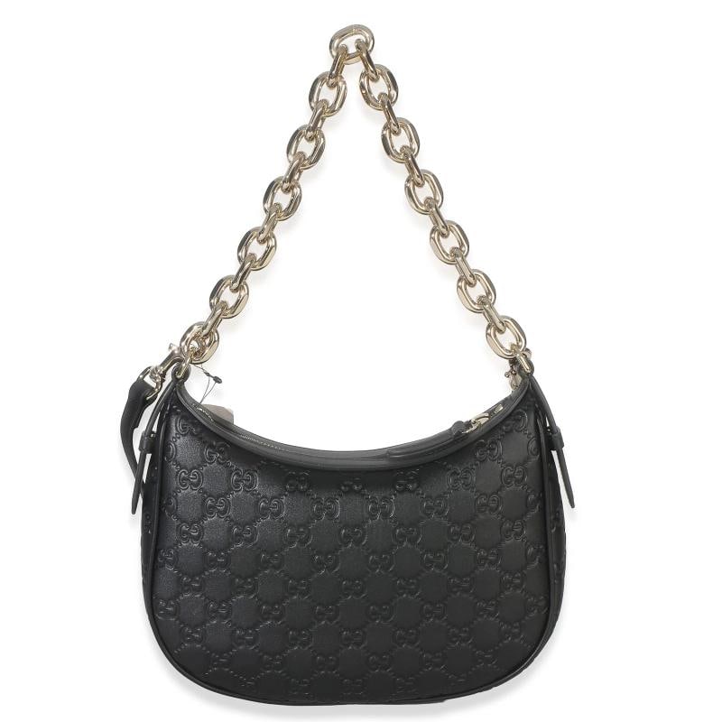 Gucci Black Embossed Calfskin GG Arabella Half Moon Shoulder Bag: Condition: Pre-owned - Good,Dimensions: 9.5 x 8 x 2,Handbag Accessories: Dustbag;Care Booklet;Retail Tag,Bag Width: 9.5 in,Bag Depth: 2 in,Bag Height: 8 in,Department: Unisex,Style: Shoulder Bag,Mater
