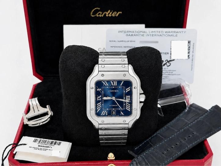 2025 Cartier Santos Large Blue Dial 4072 WSSA0071 39.8mm Steel Box Paper: Condition: Pre-owned - Excellent,Bezel Color: Silver,Movement: Mechanical (Automatic),Indices: Roman Numerals,Year Manufactured: 2025,With Papers: Yes,Band/Strap: Bracelet,Reference Number: 4072, WSSA