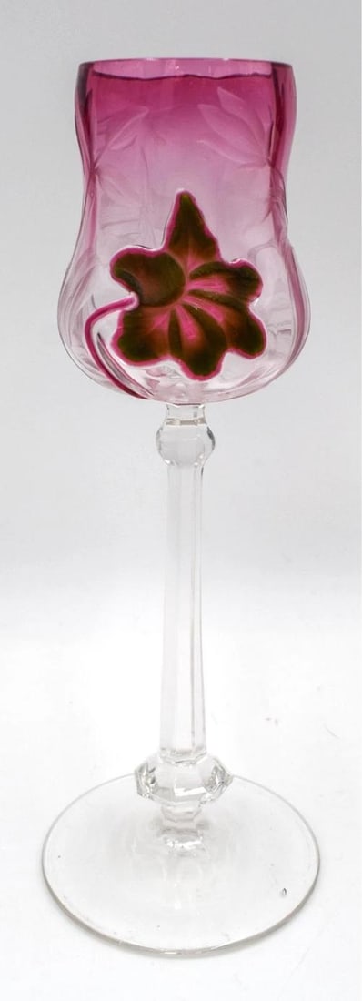 Moser Carved & Cut Marquetry Wine Glass, Cranberry & Green, Circa 1920: The Moser Carved & Cut Marquetry Wine Glass is a stunning piece of drinkware from circa 1920. Made of glass, this wine glass features intricate cranberry and green marquetry designs that add a touch