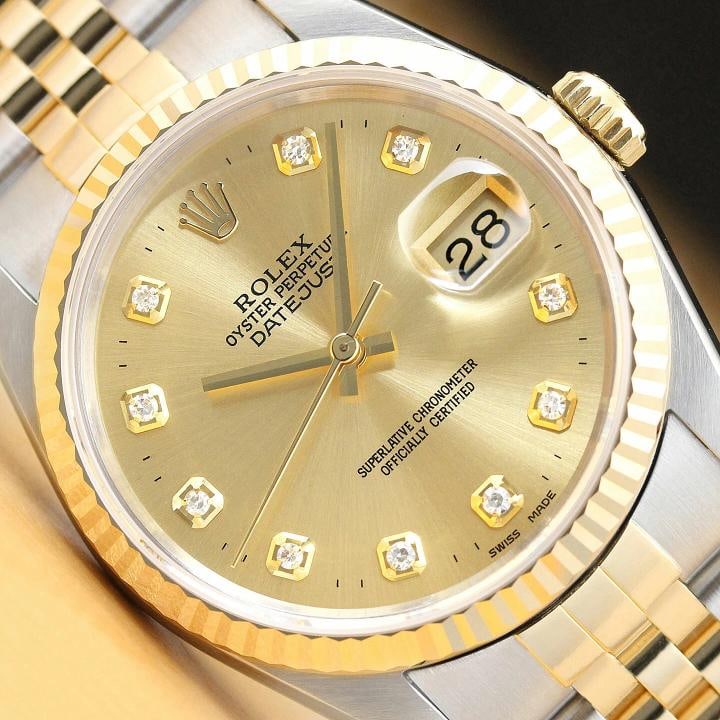 ROLEX MENS DATEJUST 16233 2-TONE CHAMPAGNE DIAMOND DIAL WATCH w/ ROLEX BAND: Condition: Pre-owned - Excellent,Bezel Color: Gold,Max Wrist Size: 7.26-7.5 in,Number of Jewels: 31 Jewels,Indices: Diamond Markers, 12-Hour Dial,Bezel: Rolex 18K Yellow Gold Fluted Bezel,Band/Strap: 