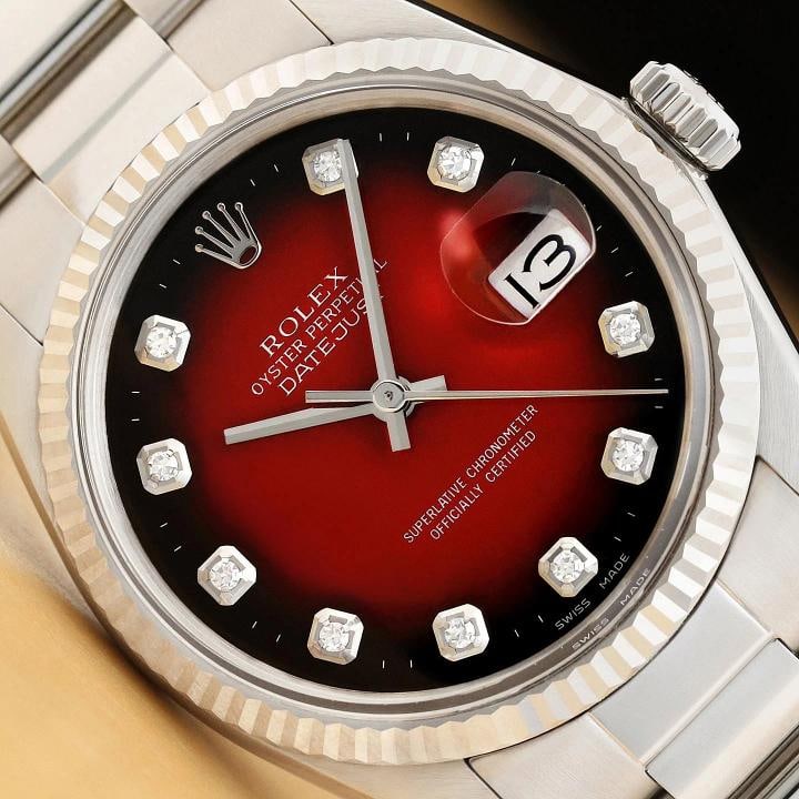ROLEX MENS DATEJUST 16014 RED VIGNETTE DIAMOND DIAL 18K GOLD STEEL OYSTER WATCH: This is an authentic Rolex Datejust 16014 watch with a Rolex 18K white gold fluted bezel, Rolex dial Ref. with added diamond markers, and custom stainless steel oyster bracelet. Descriptions: Brand: R