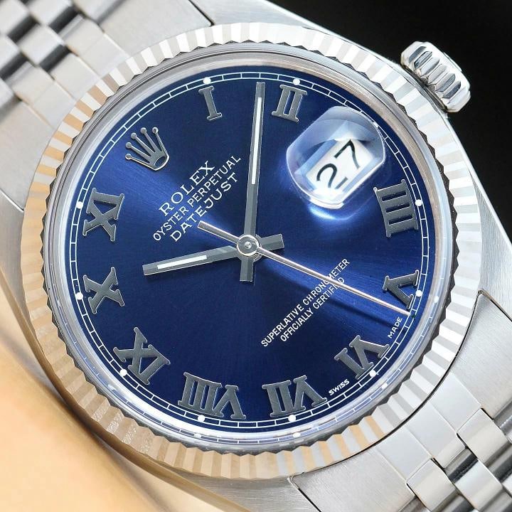 MENS ROLEX DATEJUST 16014 BLUE ROMAN 18K WHITE GOLD STAINLESS STEEL WATCH: Condition: Pre-owned - Excellent,Bezel Color: Silver,Closure: Buckle,Max Wrist Size: 7.26-7.5 in,Number of Jewels: 27 Jewels,Indices: Roman Numerals, 12-Hour Dial,Bezel: Rolex 18K White Gold Fluted Be