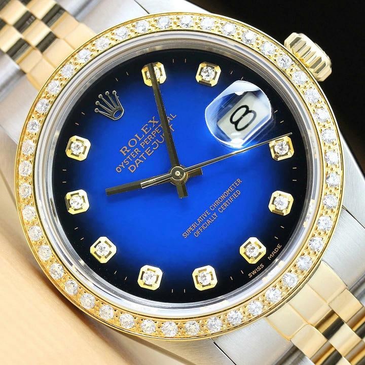 ROLEX MENS DATEJUST 16013 BLUE VIGNETTE 18K YELLOW GOLD DIAMOND STEEL WATCH: Condition: Pre-owned - Excellent,Bezel Color: Gold,Max Wrist Size: 7.26-7.5 in,Number of Jewels: 27 Jewels,Indices: Diamond Markers, 12-hour Dial,Bezel: Custom 18K Yellow Gold Diamond Bezel,Band/Strap