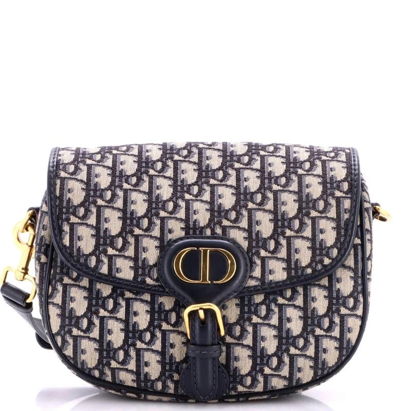 Christian Dior Bobby Flap Bag Oblique Canvas Medium: Condition: Pre-owned - Good,Brand: Christian Dior,Exterior Material: Canvas Plain,Style: Cross Body Bags,Exterior Color: Blue,Department: Women,Size: Medium,Accessories: With Strap Estimated Retail Pr