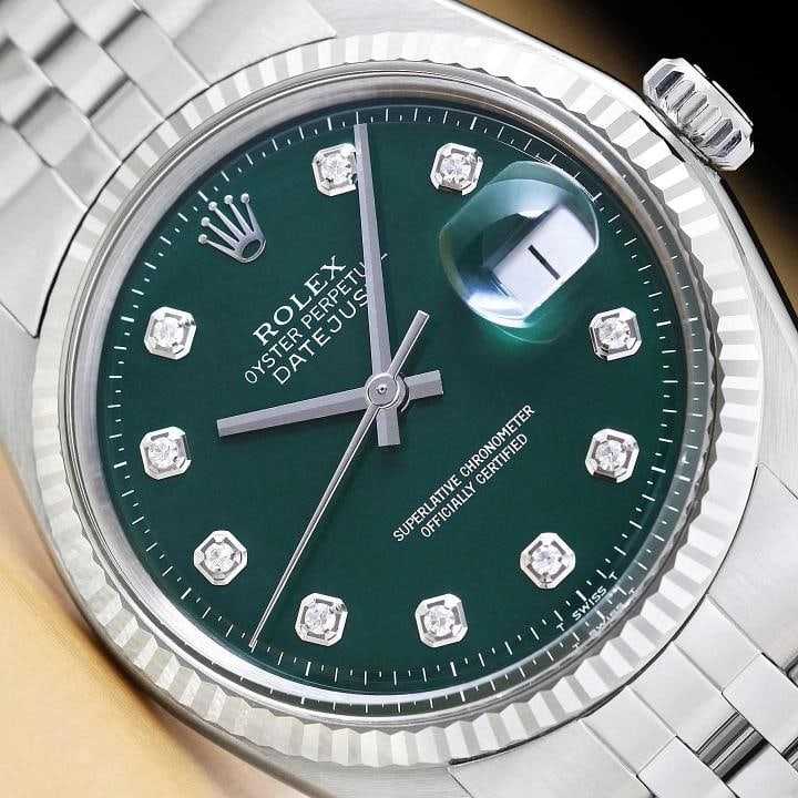 ROLEX MENS DATEJUST 1601 18K WHITE GOLD STEEL GREEN DIAMOND FOLDED JUBILEE WATCH: Condition: Pre-owned - Excellent,Bezel Color: Silver,Max Wrist Size: 7.26-7.5 in,Number of Jewels: 26 Jewels,Indices: Diamond Markers, 12-Hour Dial,Bezel: Rolex 18K White Gold Fluted Bezel,Band/Strap: