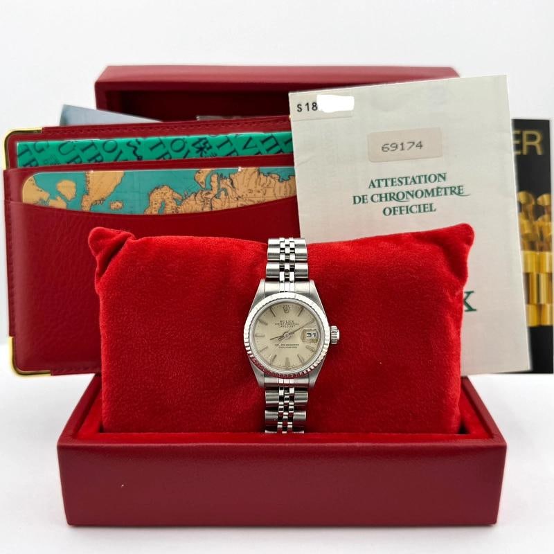 Rolex Ladies Datejust 69174 26mm Silver Dial Steel 18K White Gold Box Papers: Condition: Pre-owned - Excellent,Country of Origin: Switzerland,Bezel Color: Silver,Year Manufactured: 1990-1999,Band/Strap: Rolex Jubilee,Case Color: Silver,Department: Women,Bezel Type: Fluted,Watch