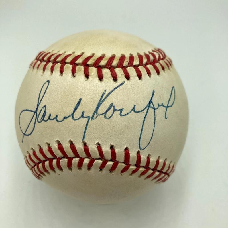 Sandy Koufax Signed Official National League Baseball PSA DNA COA: Sport: Baseball,Player: Sandy Koufax,Signed: Yes,Autograph Authentication: Beckett Authentication Services (BAS),Original/Reprint: Original,Product: Ball,Team: Los Angeles Dodgers,Country of Origin: