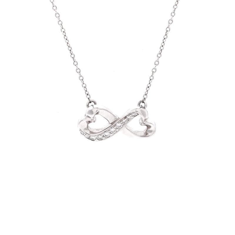 Tiffany & Co. Paloma Picasso Double Loving Heart Pendant Necklace 18K White Gold: Condition: Pre-owned - Good,Brand: Tiffany & Co.,Main Stone: Diamond,Metal: 18K White Gold,Metal Purity: 18K,Style: Pendant,Type: Necklace,Color: White Gold,Material: 18K White Gold, Diamond