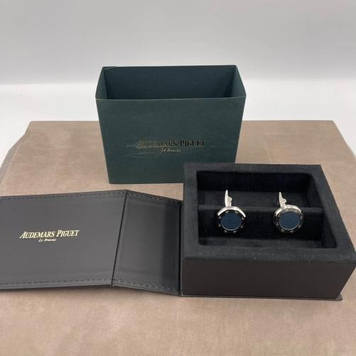 Audemars Piguet Stainless Steel Cufflinks in Blue: Condition: New with imperfections,Brand: Audemars Piguet,Type: Cufflinks,Department: Men,Metal Purity: N/A,Color: Blue,Style: N/A,Metal: Stainless Steel,Country of Origin: Switzerland,Main Stone: No