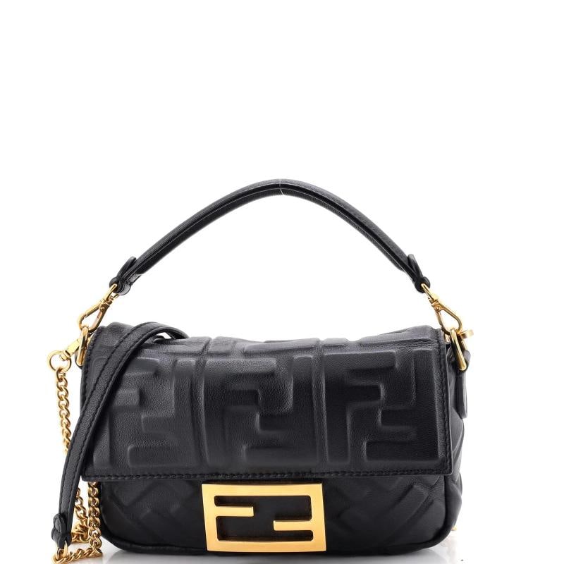 Fendi Baguette NM Bag Zucca Embossed Leather Mini: Condition: Pre-owned - Good,Brand: Fendi,Exterior Material: Leather,Style: Cross Body Bags,Exterior Color: Black,Department: Women,Size: Mini,Accessories: Extra Strap, With Strap Condition: Great. Ext