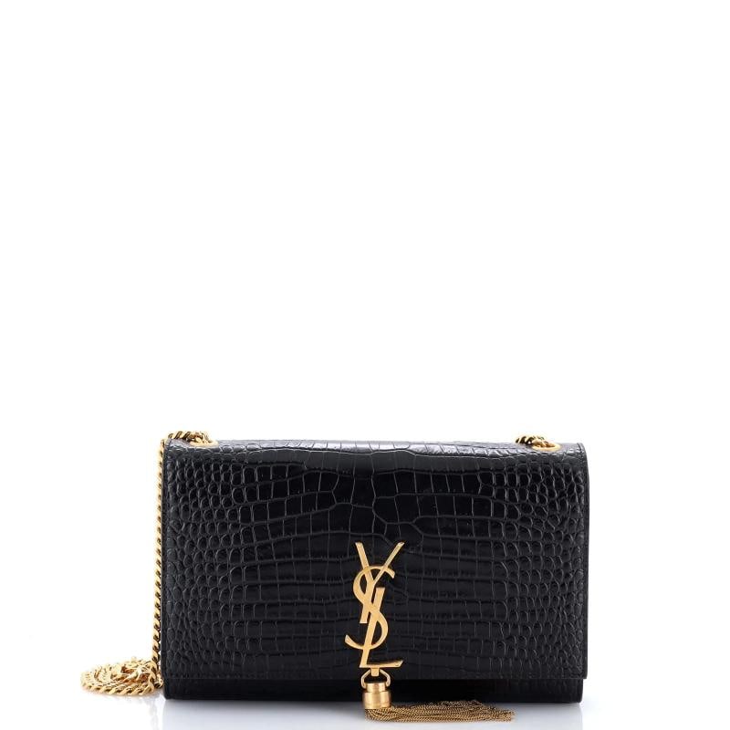 Saint Laurent Classic Monogram Tassel Crossbody Bag Crocodile Embossed Leather: Measurements: Handle Drop 10", Height 6", Width 9.5", Depth 2", Strap Drop 19" . Condition: Pre-owned - Good,Brand: Saint Laurent,Exterior Material: Leather,Style: Cross Body Bags,Exterior Color: Blac