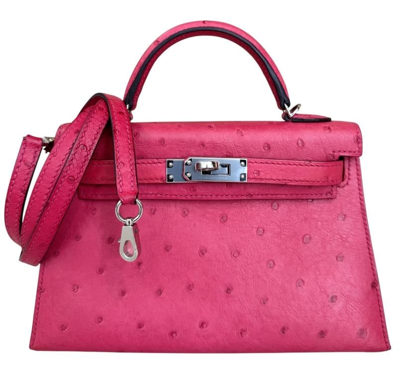 Hermes Kelly Mini 20 Rose Tyrien Pink Ostrich Leather Palladium Hardware RARE: Condition: Pre-owned - Excellent,Pattern: Solid,Shape: Rectangle,Closure: Turn Lock,Character: Kelly,Handle/Strap Color: Pink,Size: Mini,Handle Style: Top Handle,Lining Material: Leather,Hardware Colo
