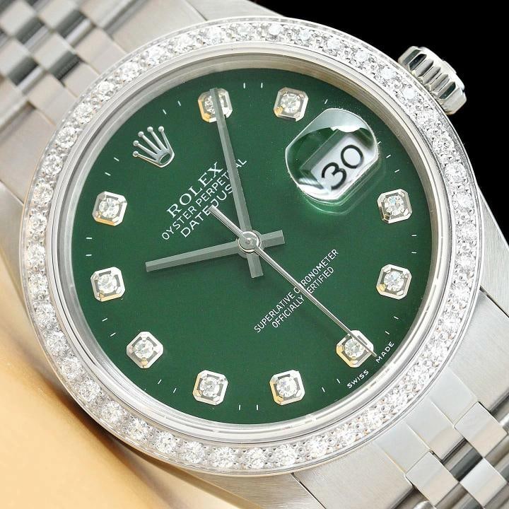 MENS ROLEX DATEJUST 16014 GREEN DIAMOND DIAL 18K WHITE GOLD STEEL WATCH: Condition: Pre-owned - Excellent,Bezel Color: Silver,Max Wrist Size: 7.26-7.5 in,Number of Jewels: 27 Jewels,Indices: Diamond Markers, 12-Hour Dial,Bezel: Custom 18K White Gold Diamond Bezel,Band/Stra