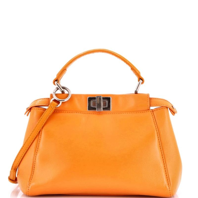Fendi Peekaboo Bag Leather Mini: Accessories: With Strap Measurements: Handle Drop 4.5", Height 7", Width 9.5", Depth 4", Strap Drop 17-23". Condition: Pre-owned - Good,Brand: Fendi,Exterior Material: Leather,Style: Shoulder Bags,Ext