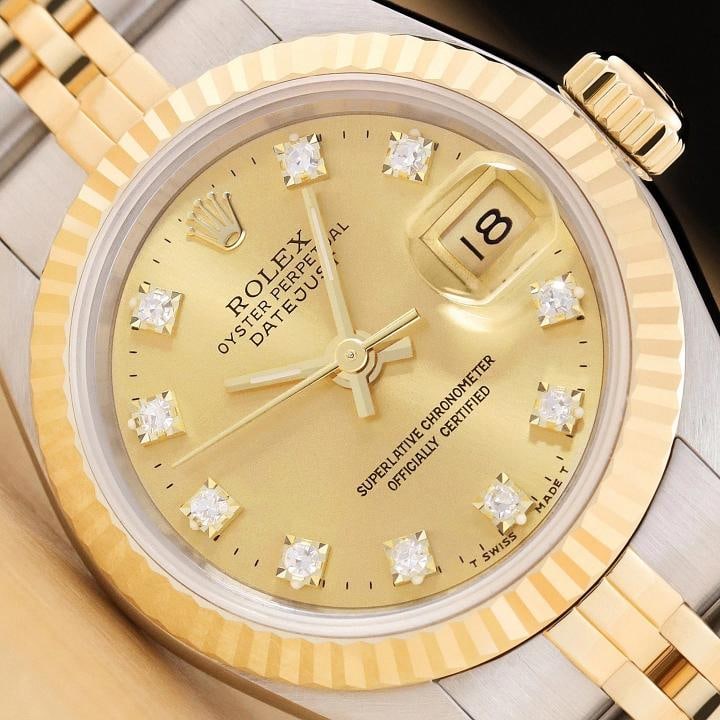 ROLEX LADIES DATEJUST 69173 CHAMPAGNE 2-TONE FACTORY DIAMOND DIAL QUICKSET WATCH: This is an authentic Rolex Datejust 69173 watch with Rolex 18K yellow gold and stainless steel jubilee bracelet, factory Rolex diamond dial Ref., and Rolex 18K yellow gold fluted bezel. Descriptions: 