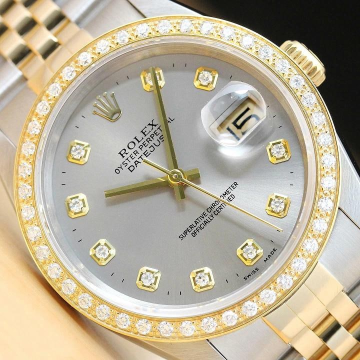 ROLEX MENS DATEJUST 16233 GRAY DIAMOND DIAL 18K YELLOW GOLD STEEL WATCH: This is an authentic Rolex Datejust 16233 watch with Rolex 18K yellow gold and stainless steel jubilee bracelet, Rolex dial Ref. with added genuine diamond markers, and custom 18K yellow gold diamond 