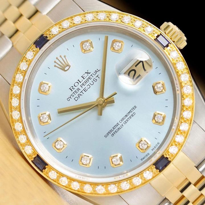 ROLEX MENS DATEJUST 16013 DIAMOND SAPPHIRE 18K YELLOW GOLD STEEL ICE BLUE WATCH: This is an authentic Rolex Datejust 16013 watch with Rolex two tone 18K yellow gold and stainless steel jubilee bracelet, Rolex dial Ref. with added genuine diamond markers, and custom 18K yellow gold