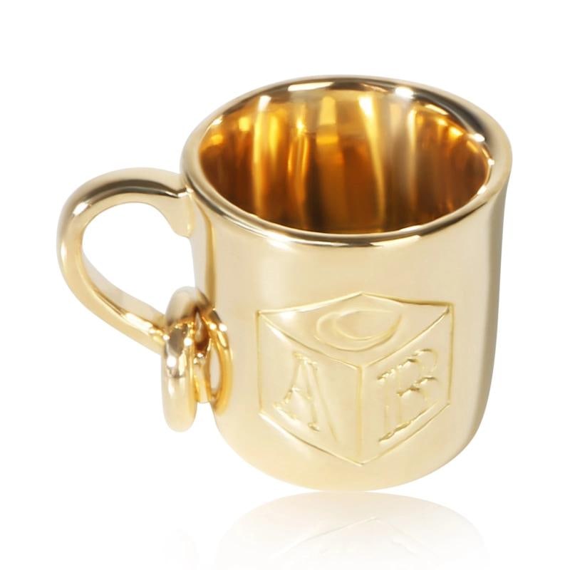 Tiffany & Co. Yellow Gold Baby Cup Charm: Condition: Pre-owned,Side Stone Type: No Stone,Metal Purity: 18k,With Original Box/Packaging: No,With Papers: No,Gross Weight (grams): 6.91,Department: Unisex,Collection: Baby Cup,Type: Charms,Main