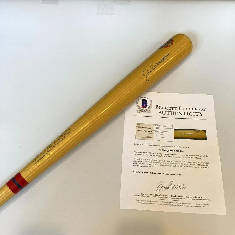 Joe Dimaggio Signed Hall Of Fame Cooperstown Baseball Bat Beckett COA: Product: Bat,Sport: Baseball-MLB,Autograph Authentication: Beckett Authentication Services (BAS),Team: New York Yankees,Player: Joe DiMaggio,Original/Reprint: Original,Country of Origin: United States
