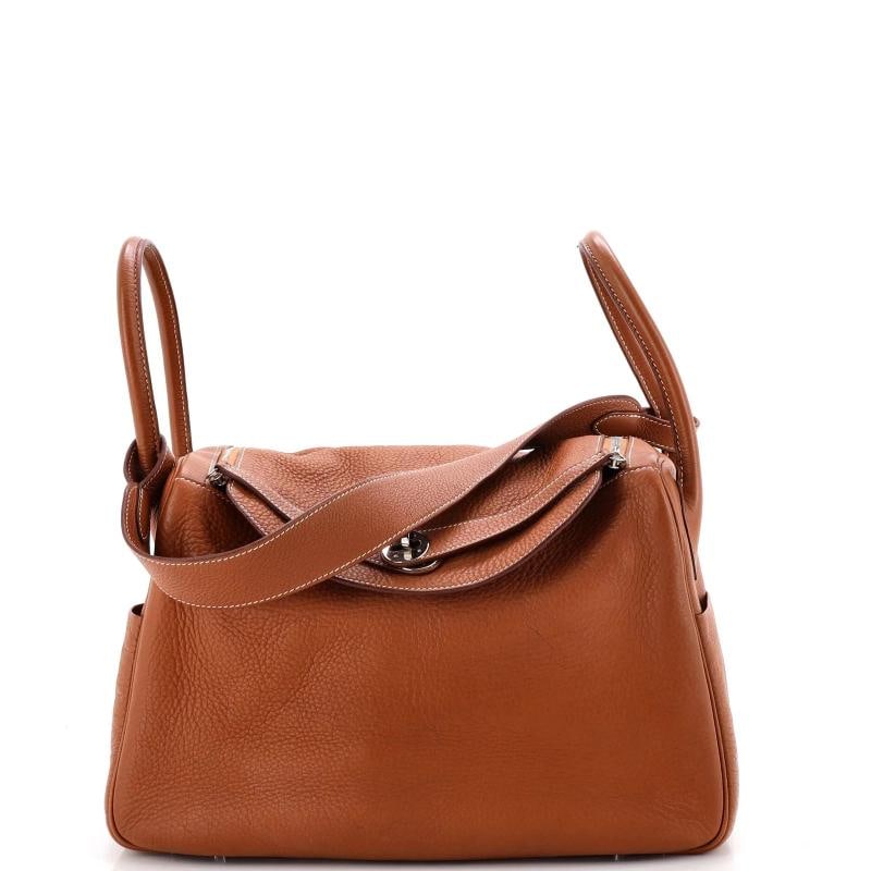 Hermes Lindy Bag Clemence 34: Condition: Pre-owned - Good,Brand: Hermes,Exterior Material: Leather,Style: Satchels,Exterior Color: Brown,Department: Women,Size: 34,Accessories: Dust Bag Estimated Retail Price: $8,700 Condition: Gr