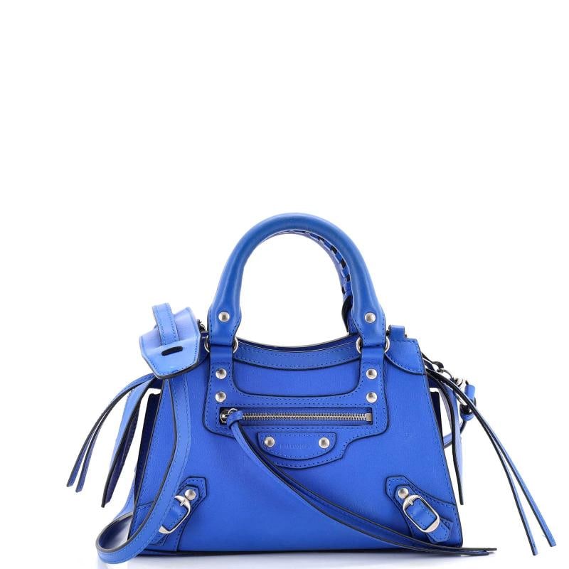 Balenciaga Neo Classic City Bag Leather Mini: Accessories: With Strap Measurements: Handle Drop 3", Height 5.5", Width 9", Depth 4.5", Strap Drop 20-25". Condition: Pre-owned - Excellent,Brand: Balenciaga,Exterior Material: Leather,Style: