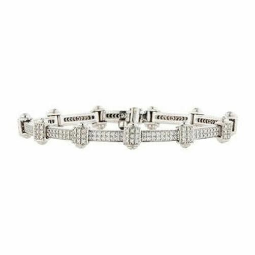 PHILIPPE CHARRIOL 18k White Gold Pave Diamond Bracelet 1.00 tcw: Metal: 18k White Gold Length: 7 Inches Width: 18 MM at the Diamond Station / 4 MM Bracelet Diamonds: Round Diamonds 1.00 TCWCondition: Pre-owned - Excellent,Modified Item: No,Total Carat Weight: 1.00