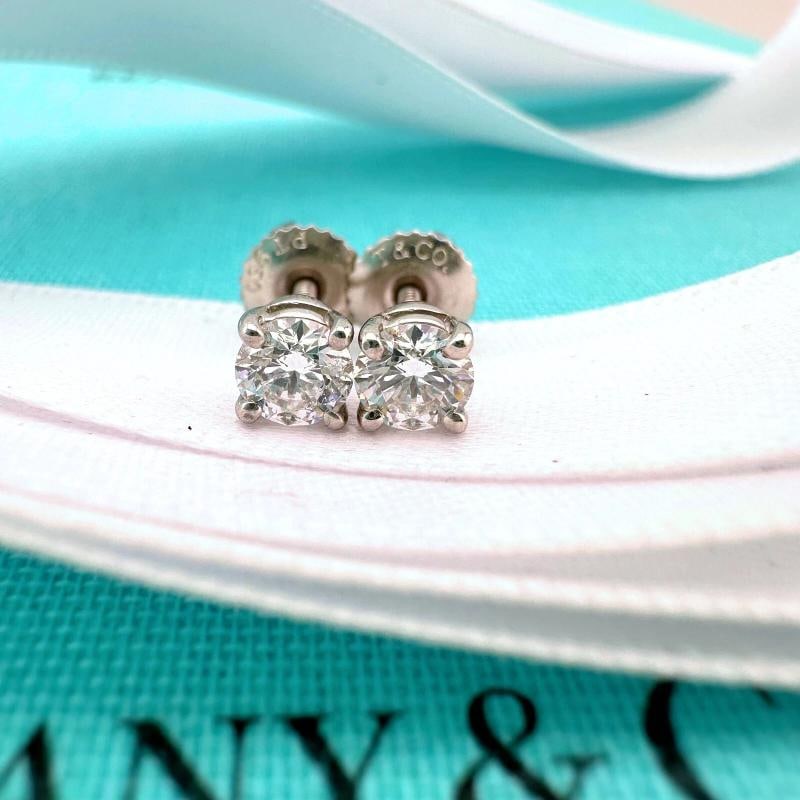 Tiffany & Co Platinum Round Diamond Stud Earrings 0.54 tcw: Metal: Platinum Pt950 TCW: 0.54 tcw Diamond 1: Round Brilliant 0.27 F - VS1 GIA Diamond 2: Round Brilliant 0.27 F - VS1 GIA . Condition: Pre-owned - Excellent,Number of Diamonds: 2,Main Stone
